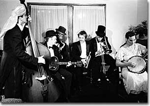 The Squirrel Nut Zippers jam at the Pink House.