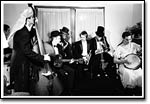 The Squirrel Nut Zippers swing hard during "The Pink House" 1920s party.