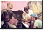 Cinematographers Todd Walker and John Kelleran plan their attack with "Pink House" director Ian Williams.