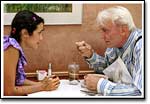 "Pink House" resident Windy (Natane Boudreau) stuns Pritchard (Gil Rogers) at dinner.